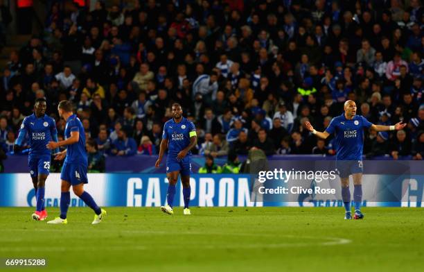 Wes Morgan of Leicester City is dejected after Atletico Madrid score their first goal during the UEFA Champions League Quarter Final second leg match...