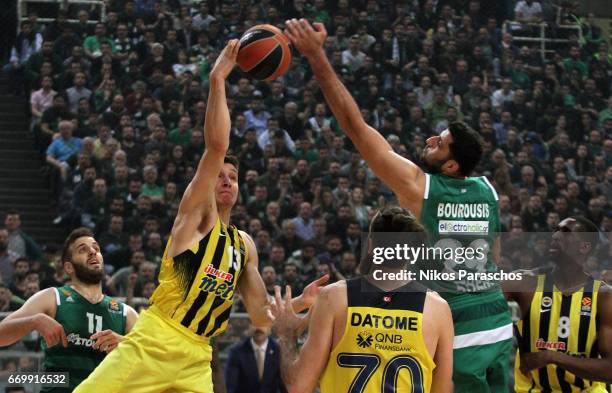 Bogdan Bogdanovic, #13 of Fenerbahce Istanbul competes with Ioannis Bourousis, #29 of Panathinaikos Superfoods Athens during the 2016/2017 Turkish...