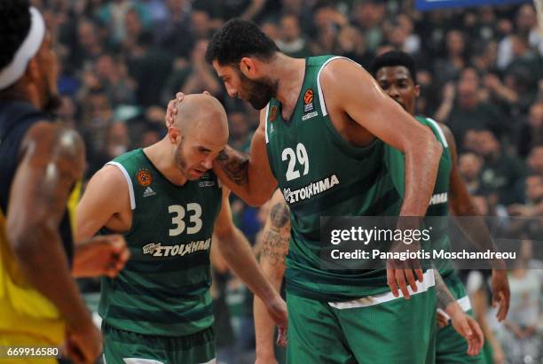 Nick Calathes, #33 and Ioannis Bourousis, #29 react during the 2016/2017 Turkish Airlines EuroLeague Playoffs leg 1 game between Panathinaikos...