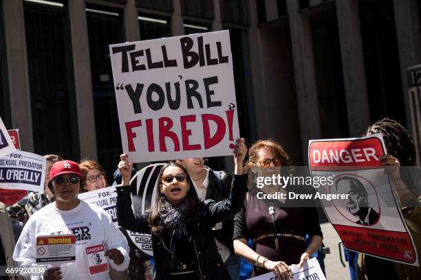 Demonstrators rally against Fox News television personality Bill O'Reilly outside of the News Corp. And Fox News headquarters in Midtown Manhattan,...