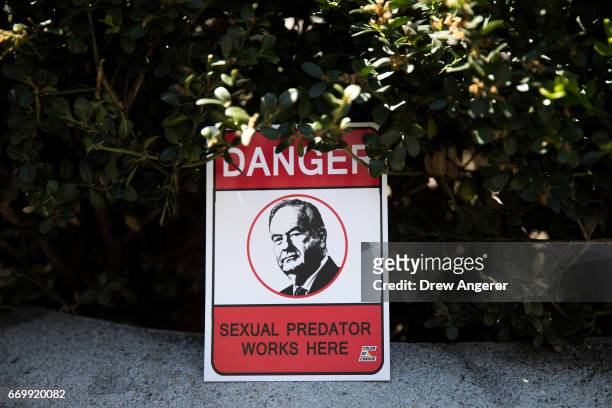 Sign left by a protestor sits outside of the News Corp. And Fox News headquarters following a rally against Fox News television personality Bill...