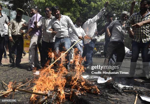 The drivers of Ola and Uber protesting against the government's policy outside Delhi CM Arvind Kejriwal's House at Civil Line on April 18, 2017 in...