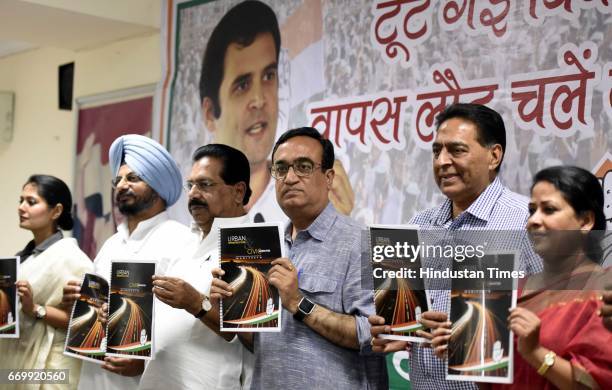 Delhi Pradesh Congress Committee President Ajay Maken with other leaders releases the Delhi Congress manifesto on Urban Infrastructure, fifth in the...