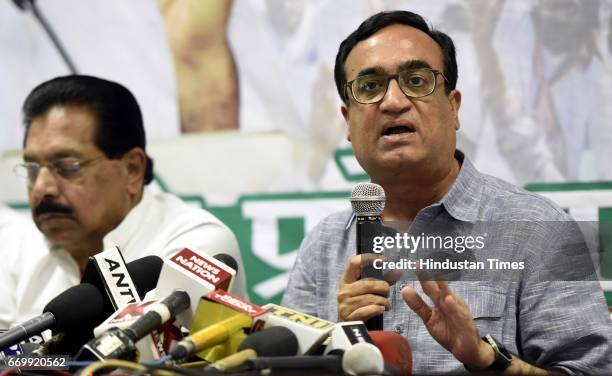 Delhi Pradesh Congress Committee President Ajay Maken with other party leaders addresses a press conference before the manifesto release on Urban...