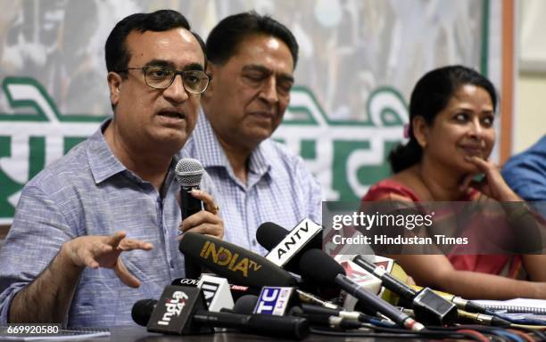 Delhi Pradesh Congress Committee President Ajay Maken with other party leaders addresses a press conference before the manifesto release on Urban...