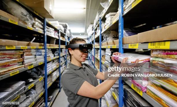 The Microsoft's HoloLens, a mixed reality smartglas, is seen at Montapacking in Molenaarsgraaf, on April 18, 2017. With the glasses life-like...