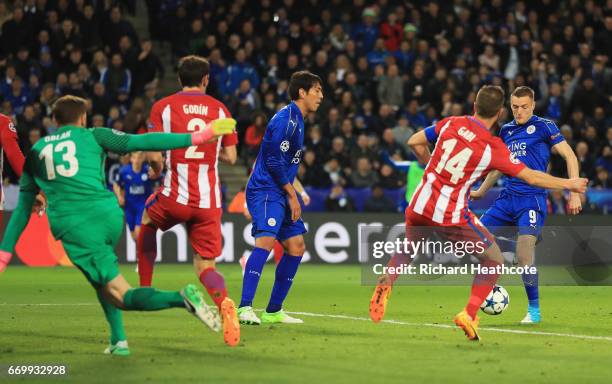 Jamie Vardy of Leicester City scores his sides first goal during the UEFA Champions League Quarter Final second leg match between Leicester City and...