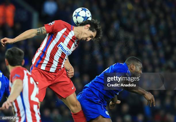 Stefan Savic of Atletico Madrid in action against Wes Morgan of Leicester City during Champions League Quarter Final soccer match between Leicester...