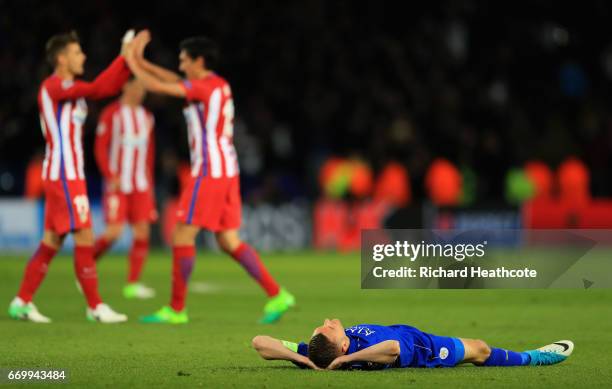 Jamie Vardy of Leicester City is dejected as the Atletico Madrid team cleberate after the UEFA Champions League Quarter Final second leg match...