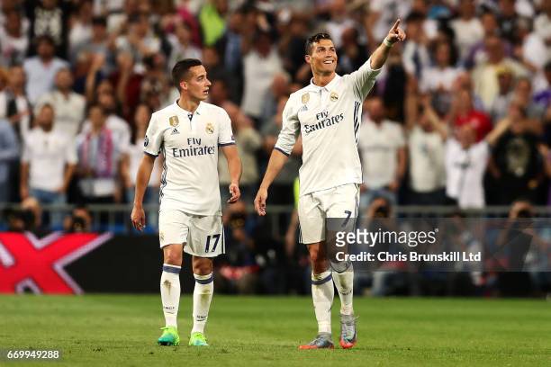 Cristiano Ronaldo of Real Madrid CF celebrates scoring his side's second goal during the UEFA Champions League Quarter Final second leg match between...