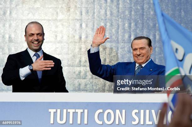Silvio Berlusconi , leader of centre-right People of Freedom party , and Angelino Alfano, PdL's general secretary during the national protest 'Tutti...