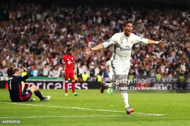 Cristiano Ronaldo of Real Madrid CF celebrates scoring his side's third goal during the UEFA Champions League Quarter Final second leg match between...