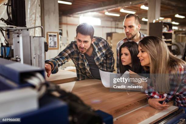 learning how to use a cnc machine - cnc machine stock pictures, royalty-free photos & images