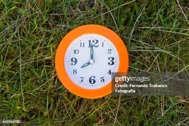 time to wake up. insomnia - orange alarm clock stock pictures, royalty-free photos & images