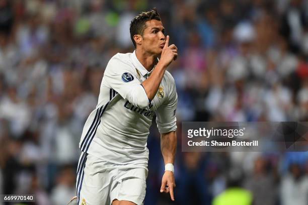 Cristiano Ronaldo of Real Madrid celebrates scoring his sides first goal during the UEFA Champions League Quarter Final second leg match between Real...