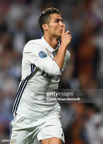 Cristiano Ronaldo of Real Madrid celebrates scoring his sides first goal during the UEFA Champions League Quarter Final second leg match between Real...