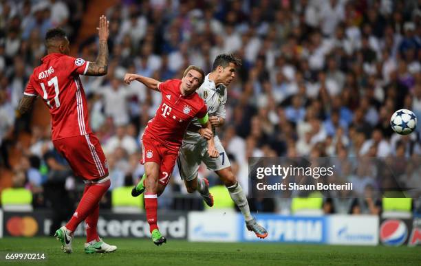 Cristiano Ronaldo of Real Madrid scores his sides first goal during the UEFA Champions League Quarter Final second leg match between Real Madrid CF...