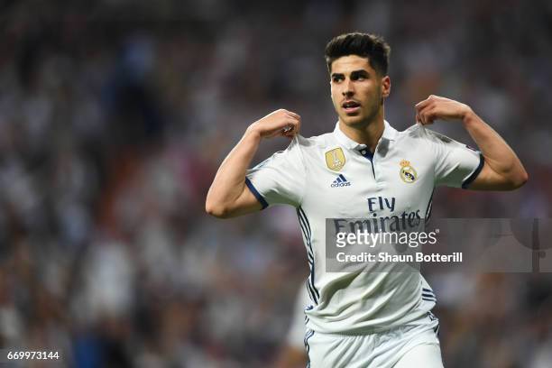 Marco Asensio of Real Madrid celebrates scoring his sides fourth goal during the UEFA Champions League Quarter Final second leg match between Real...
