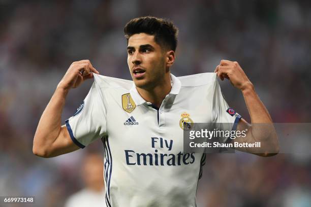 Marco Asensio of Real Madrid celebrates scoring his sides fourth goal during the UEFA Champions League Quarter Final second leg match between Real...