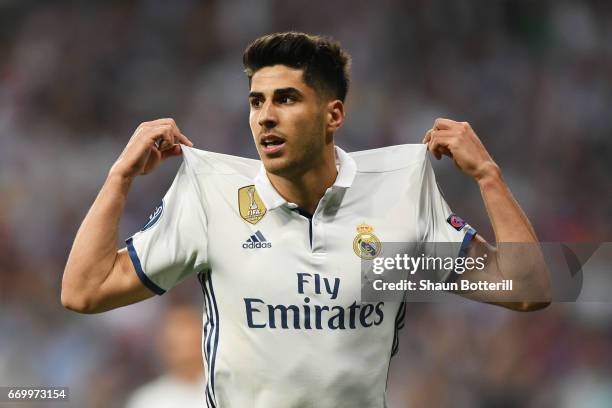 Marco Asensio of Real Madrid celebrates scoring his sides fourth goal during the UEFA Champions League Quarter Final second leg match between Real...