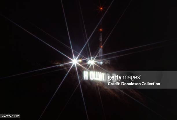 Nighttime aerial view of the Hollywood Sign lit up in July 1989 in Los Angeles.
