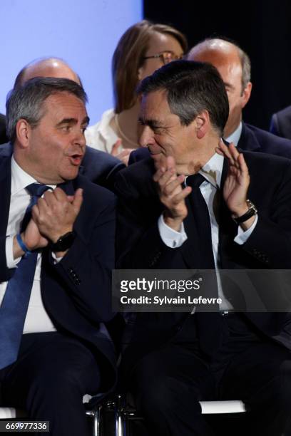 Xavier Bertrand and french presidential candidate Francois Fillon attend campaign rally on April 18, 2017 in Lille, France.