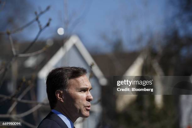 Bill Morneau, Canada's finance minister, speaks during a press conference with John Tory, mayor of Toronto, and Charles Sousa, Ontario's finance...