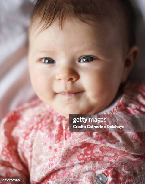 a 2 months old baby girl - affectueux stock pictures, royalty-free photos & images