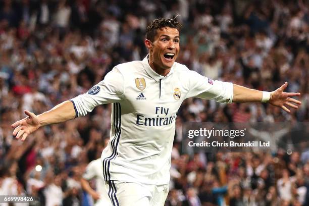 Cristiano Ronaldo of Real Madrid CF celebrates scoring his side's third goal during the UEFA Champions League Quarter Final second leg match between...