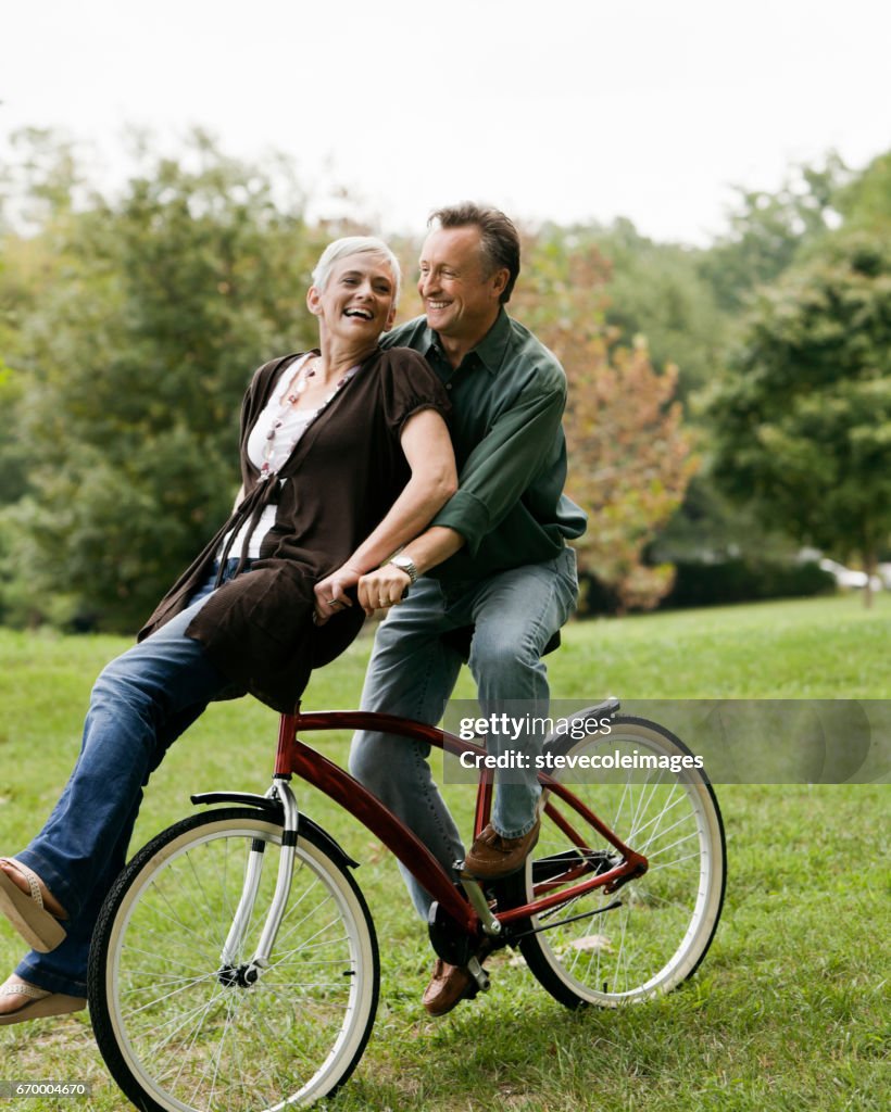 Senior Couple Riding Bicycle