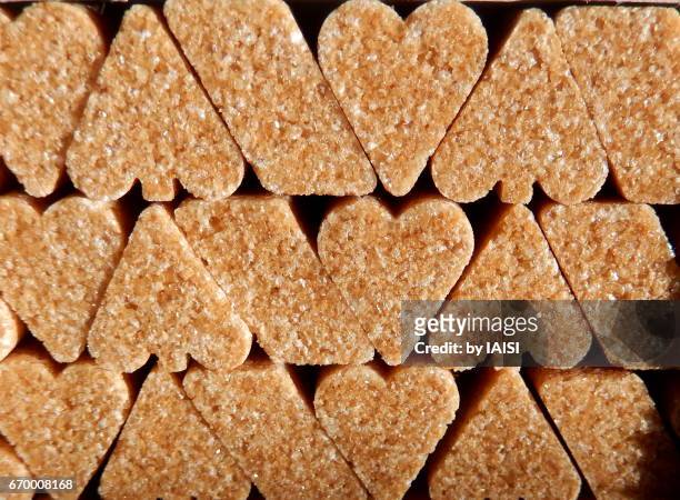 sugar with aces of hearts and aces of spades - brown sugar stock pictures, royalty-free photos & images