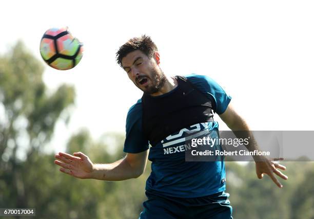 Bruno Fornaroli of Melbourne City heads the ball during a Melbourne City A-League training session at City Football Academy on April 19, 2017 in...