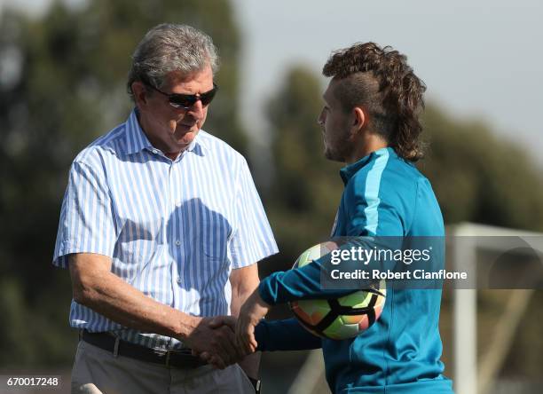 Roy Hodgson greets Fernando Brandan of Melbourne City on during a Melbourne City A-League training session at City Football Academy on April 19, 2017...