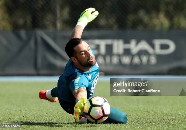 Melbourne City goalkeeper Dean Bouzanis makes a save during a Melbourne City A-League training session at City Football Academy on April 19, 2017 in...