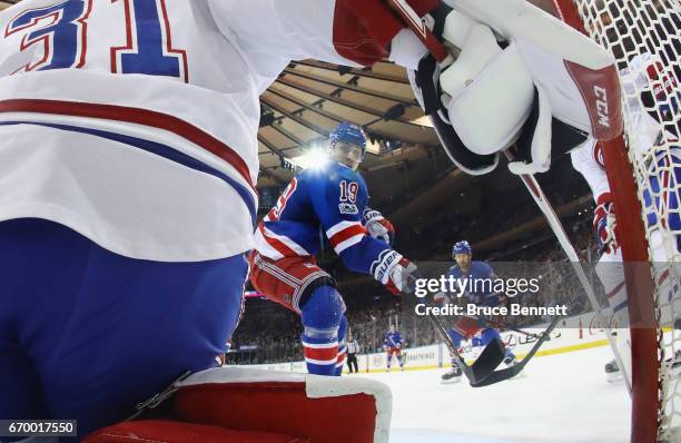 Jesper Fast of the New York Rangers scores in the first period against Carey Price of the Montreal Canadiens in Game Four of the Eastern Conference...