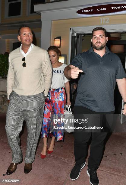 Alex Rodriguez and Jennifer Lopez leaving Prime 112 Steakhouse aftre dinner on April 18, 2017 in Miami, Florida.