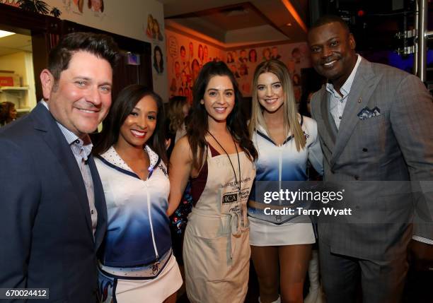 Jay DeMarcus, Elika Sadeghi, and Kevin Carter pose with Tennessee Titans Cheerleaders during the 16th Annual Waiting for Wishes Celebrity Dinner...