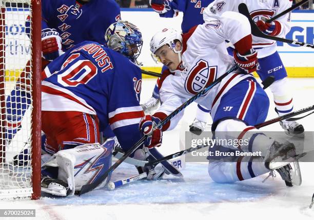 Brendan Gallagher of the Montreal Canadiens is stopped during the first period by Henrik Lundqvist of the New York Rangers in Game Four of the...