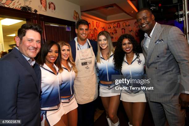 Jay DeMarcus, Marcus Mariota, and Kevin Carter pose with Tennessee Titans Cheerleaders during the 16th Annual Waiting for Wishes Celebrity Dinner...