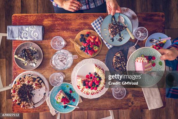 variation of berry layer cake, chocolate cake and black forest cake - cake table stock pictures, royalty-free photos & images