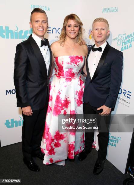 Board of Governors Taylor Shupe, Michelle O'Droske, and Founder of Thirst Project Seth Maxwell pose backstage at the Thirst Project's 8th Annual...