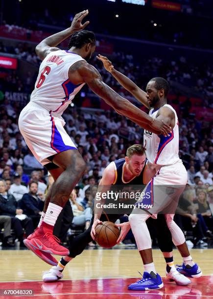 Gordon Hayward of the Utah Jazz gets trapped by DeAndre Jordan and Luc Mbah a Moute of the LA Clippers during a 99-91 Clippers win in Game Two of the...