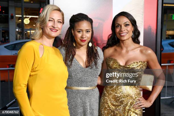Stuntwoman Zoe Bell, actor Tracie Thoms and actor Rosario Dawson attend the premiere of Warner Bros. Pictures' "Unforgettable" at TCL Chinese Theatre...