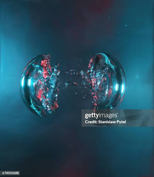 two bubbles of air, blue and red, forming two halves of a sphere - a separate peace stock pictures, royalty-free photos & images