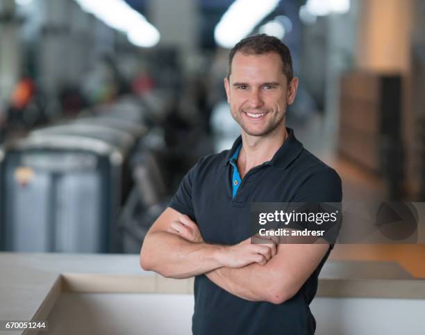 happy portrait of a business owner at the gym - leisure facilities stock pictures, royalty-free photos & images