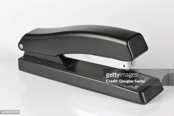 close-up of a desk stapler - tacler stock-fotos und bilder