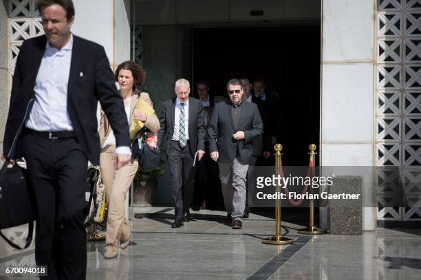 German Foreign Minister and Vice Chancellor Sigmar Gabriel and Franz Josef Kremp , German Ambassador in Iraq, leave the hotel on April 19, 2017 in...