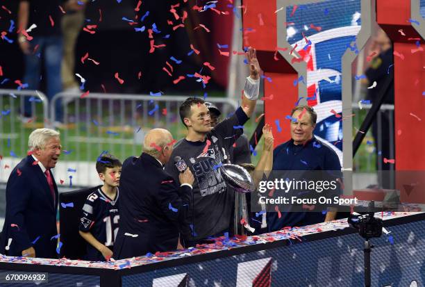 Tom Brady of the New England Patriots celebrates with the Vince Lombardi trophy after the Patriots defeat the Atlanta Falcons 34-28 in overtime of...