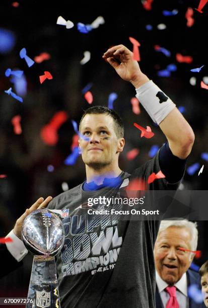 Tom Brady of the New England Patriots celebrates with the Vince Lombardi trophy after the Patriots defeat the Atlanta Falcons 34-28 in overtime of...