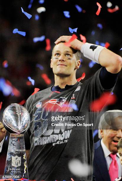 Tom Brady of the New England Patriots celebrates with the Vince Lombardi trophy after the Patriots defeat the Atlanta Falcons 34-28 in overtime of...
